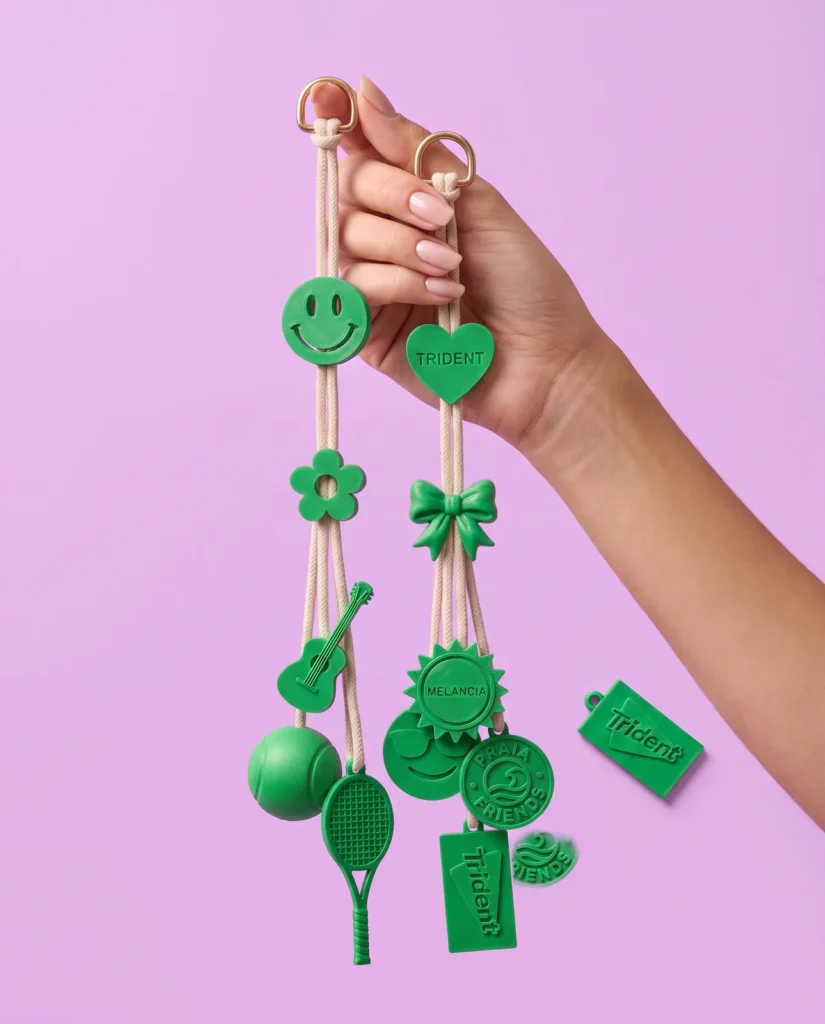 Chaveiros verdes da Trident impressos em 3D, com pingentes presos em cordão